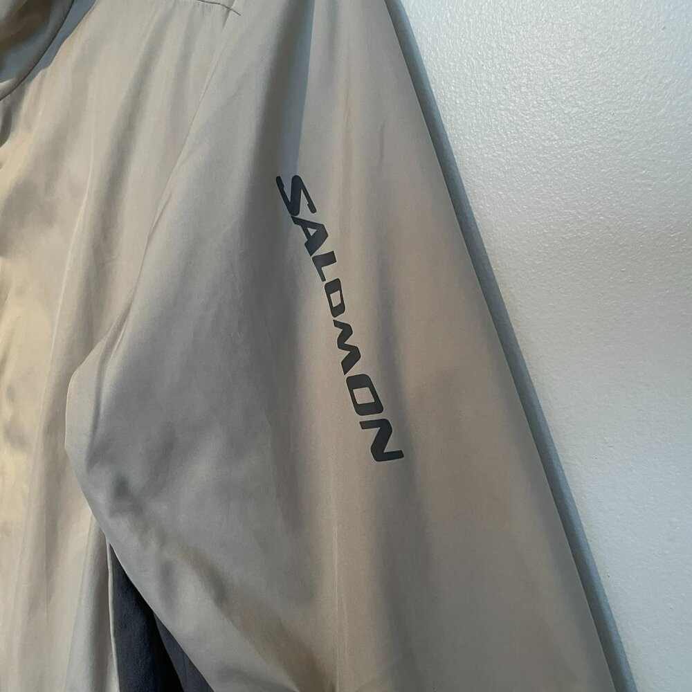 Salomon windbraker, sports wear Petite w., beige and  brown, zip up, pockets.